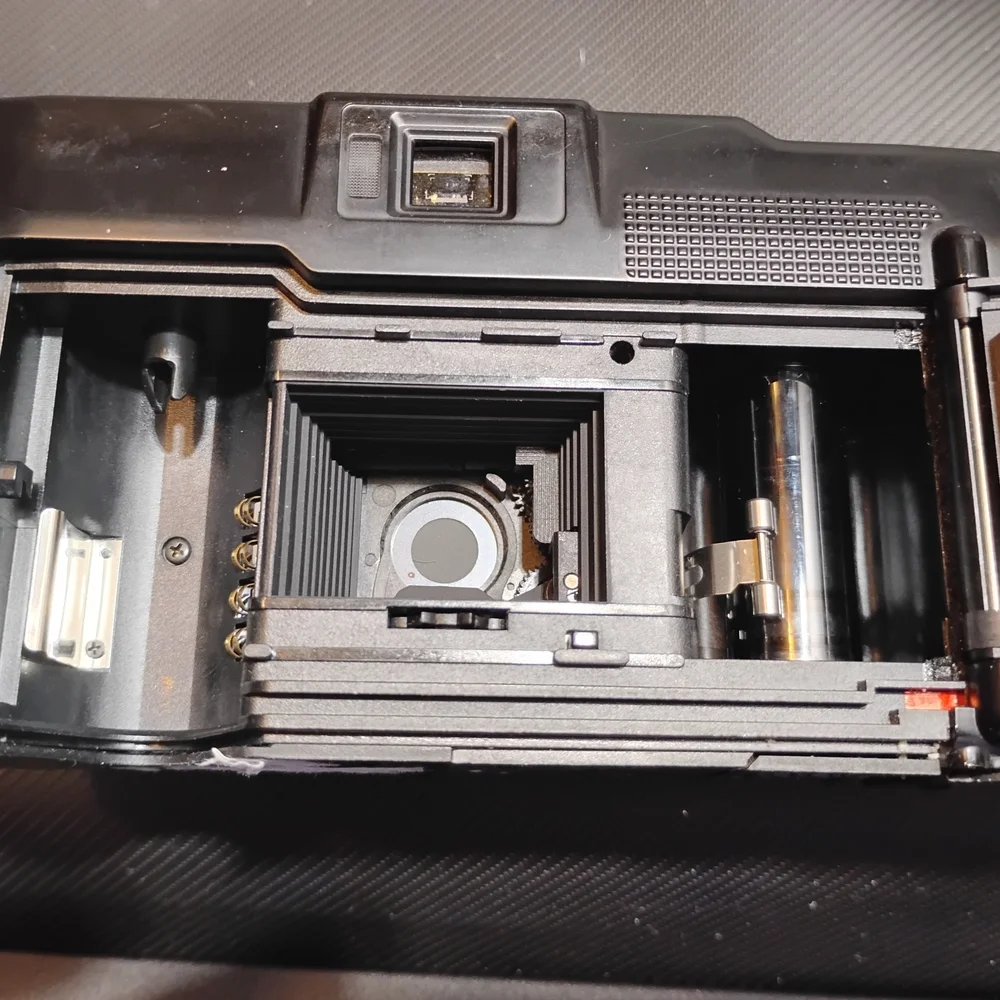 Nikon Black Camera with Gold Detail